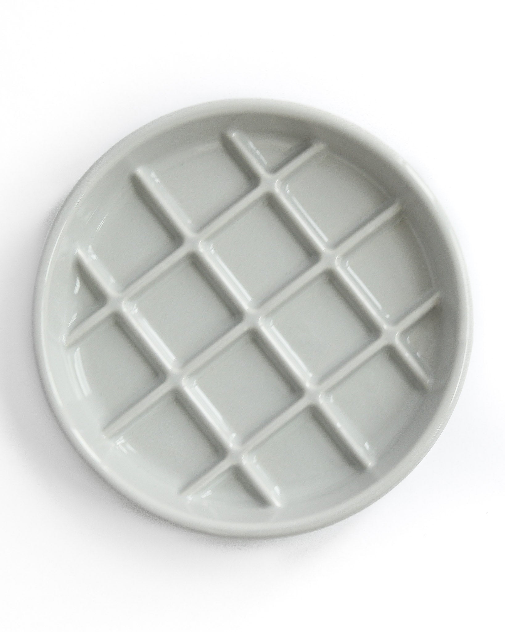 Noots gray ceramic Maple slow feed bowl with a waffle pattern 